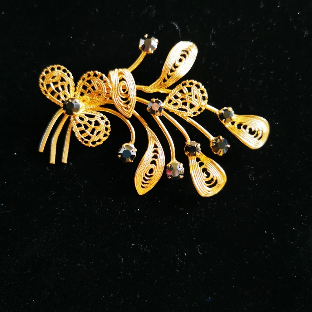 Vintage Gold Tone Floral Brooch with Dark Rhinestones